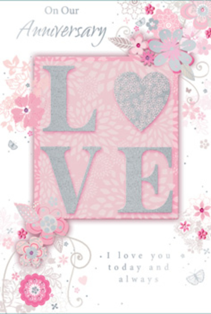 The image presents an anniversary card that feels as gentle and luminous as a pastel bouquet laid out on the counter of a cosy Friern Barnet flower shop. Dominating the middle of the design is the word 'LOVE,' rendered in tall, graceful letters that rise slightly from the surface of the card. Each letter is edged with shimmering glitter, not brashly bright but softly iridescent, reminiscent of sunlight glancing off a crystal vase in a window near Friary Park. The colour palette is composed of muted blush pinks, creamy whites, and faint silver tones, creating an almost ethereal atmosphere, like early spring blossom opening along quiet residential streets in N11. Surrounding the central word, an arrangement of stylized flowers, wispy leaves, and swirling stems drapes across the card in curved, organic lines. The blooms appear hand-drawn, their outlines fine and deliberate, with gentle shading that adds depth without harsh contrast, as if a florist had sketched out the framework for a romantic anniversary display before selecting each stem. Tiny decorative flourishes and subtle butterfly shapes sit among the petals, adding a sense of lightness and quiet joy. The background remains softly pink, providing a calm canvas that lets the glittered letters and floral motifs shine without crowding the eye. Toward the lower half and along the sides, an elegant, flowing script shares tender sentiments-simple, heartfelt phrases that speak of enduring affection and companionship. The card as a whole feels like a paper counterpart to a fragrant, hand-tied bouquet delivered by a local Friern Barnet florist: understated yet deeply romantic, created to be kept, touched, and reread on anniversaries yet to come.