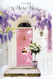 The scene shows a lovingly styled front entrance in Friern Barnet, bathed in soft daylight and filled with the quiet excitement of a new home. A pale pink door, smooth and freshly painted, stands as the focal point, its gentle hue echoed by a single matching shutter to one side. These pastel elements sit harmoniously within crisp white walls, which catch the light and give the façade a peaceful, airy quality, much like the calm residential pockets around Friary Park. Above the door, wisteria drapes in full, fragrant cascades of lavender and lilac, each bloom hanging in relaxed clusters, forming a loose floral canopy that frames the entrance like nature's own garland. At the doorstep rests a simple yet elegant grey metal bucket, positioned right at the threshold as though just placed there by a local florist after a housewarming delivery. It brims with plush white and cream roses, their petals layered and velvety, softened by wisps of fresh green foliage threaded throughout. A soft pink ribbon encircles the bucket, tied with a modest bow that picks up the tones of the door and adds a touch of gentle romance. Light filters through the trailing wisteria and falls across the roses in soft patches, creating an interplay of shadow and glow that heightens the sense of intimacy and optimism. The entire composition feels like a quiet promise whispered on a side street of Friern Barnet: flowers, fragrance, and a warm welcome waiting every time you step through the door into your new beginning.